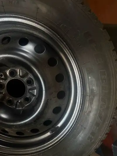 These are a set of four used winter tires, size 225/65R17,5x114.3 mm bolt pattern, mounted on rims,...
