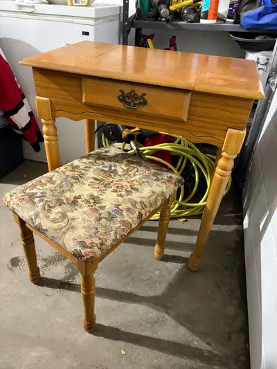 Get ready table with small drawer and plenty of space to store jewelry. Comes with bench.
