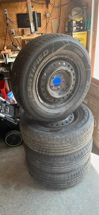 Set of summer tires on rims. Less than 5000km on them, was used on a 2007 dodge mini caravan.