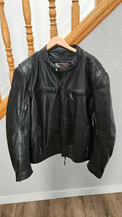 Almost new (worn twice) not even broken in armored leather Motorcycle jacket. 3x size. Vented and li...