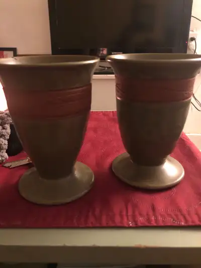 Add a touch of artisanal charm to your space with this unique pair of Catherine White pottery vases...