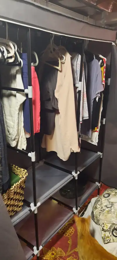 Need extra storage for clothes/purses/sweaters? Portable, sturdy enlosed by fabric with zipper cloth...