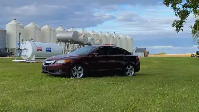 Looking to sell my Acura ILX 2014 with 214k miles (344400 km), manual transmission, and a 2.4L engin...