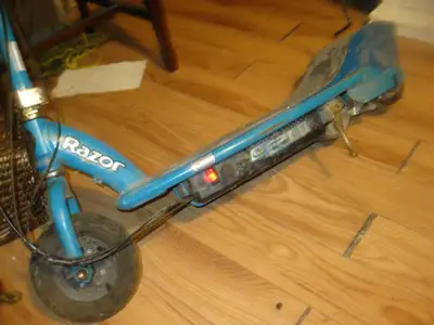 Battery holds power. If you have an E200 Razor electric scooter with an operational rear wheel and b...