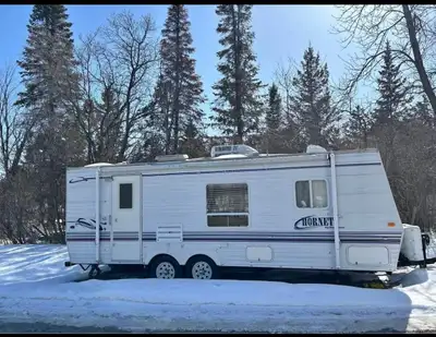 Our 26 ft Keystone Hornet RV is perfect for family trips, camping, or weekend adventures. It comfort...