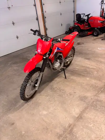 Bike has approximately 15–20 total hours of use and has been ridden exclusively on rural dirt roads...
