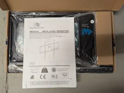 New in box TV mount, good for 42-70 inch monitor or TV. I have also a set of two wall plates to run...