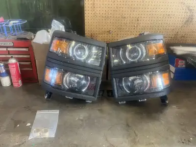 OEM projector headlights. With upgraded D2 LED Bulbs, dual high beams, 3m on lenses and black rock g...