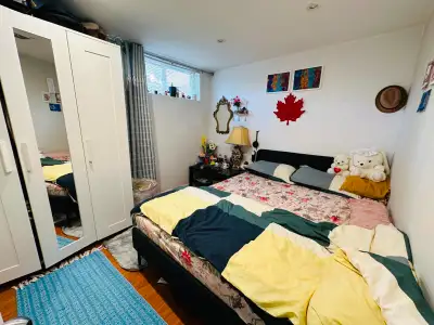 Private room with very large windows for rent in basement available for short term or long term. Nea...