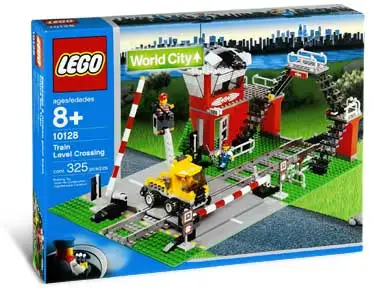 Lego Train Level Crossing set. Includes box and instructions in great shape. Rare vintage set from 2...