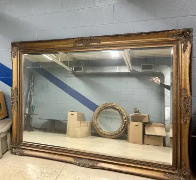 Extra-large beveled wall mirror with ornate gold fram, View more
