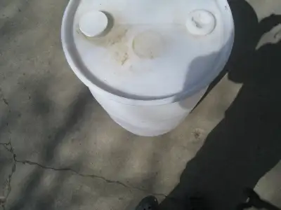 WHITE OR BLUE 55 GALLON PLASTIC BARRELS, View more
