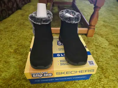 Brand new black, size 6.5 women's slip on snow boots. These were a gift for my mom but they didn't f...