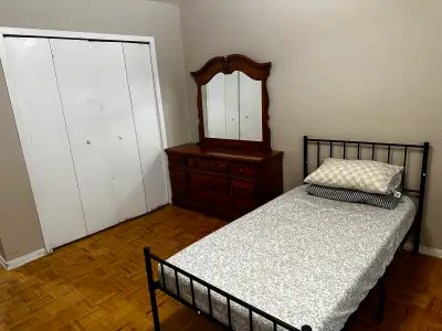 Male preferred Spacious and bright Separate room in an apartment, furnished with twin size bed and m...