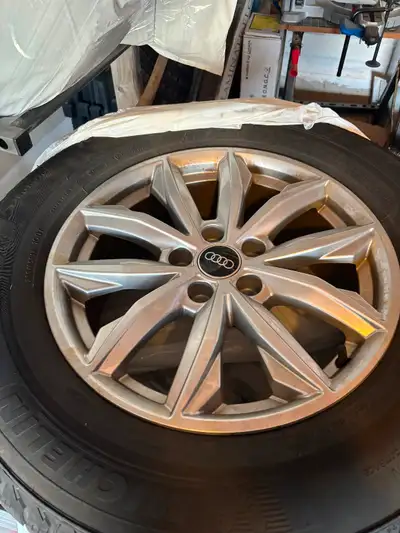Michelin X-Ice- premium tires & Rims.(x4) 235/65 R17. Used 1 winter season. Wife wanted larger vehic...