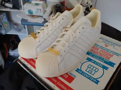 These are brand new shoes without the box. Size is 10. The SUPERSTAR sign on the front is removable....