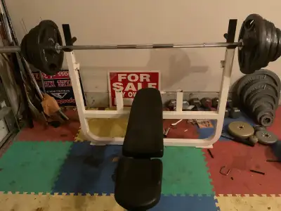 300 pound Olympic weight set and bench Press, View more