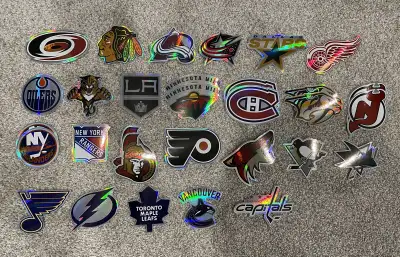 Add some team spirit to your collection with these NHL prismatic stickers! These used stickers are i...