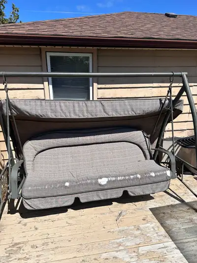 Free patio swing for pick up today in Gannon Village