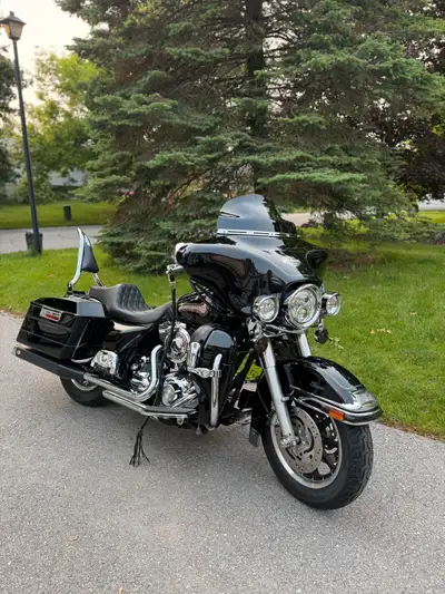 Selling my 2007 Electra Glide Classic, tastefully upgraded and dressed as a Street Glide. Well-maint...