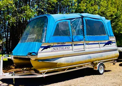 Beautiful and exceptionally well cared for 22FT Southland Luxuria pontoon boat with trailer included...