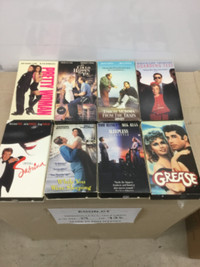 8 assorted VHS TAPES