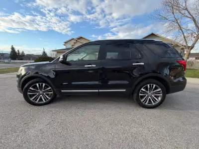 2016 Ford Explorer Platinum 4WD — black exterior, beige leather interior. This is the top-of-the-lin...
