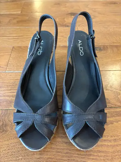 Aldo Wedge Sandals (Size 39 / 8.5 US). Great condition. Only worn a few times. Dark brown in colour....