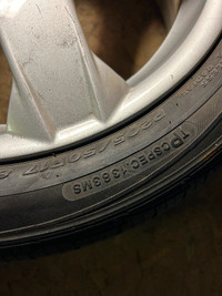 4 Michelin X-ice tires.    4 Chevy Aluminum rims