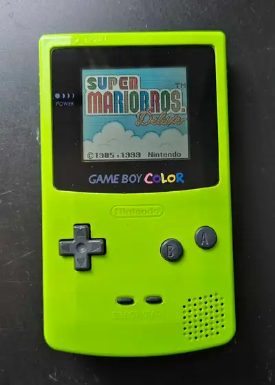 Nintendo Game Boy Color CGB-001 + Super Mario Bros. Deluxe game, View more