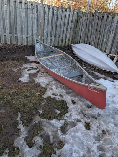 15.5 ft Kanuck canoe. Made in Canada. Some kind of plastic poly, very rigid. Stable in the water, tr...