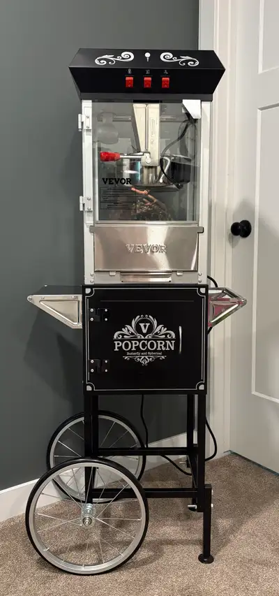 Brand New in Box Popcorn Maker with storage cart. Black. Popper is 8 oz capacity and 850 watts. I ac...