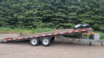 18,000LB GVWR. Deck tilts and has slides for a shipping container and a 12,000LB winch. Can be used...