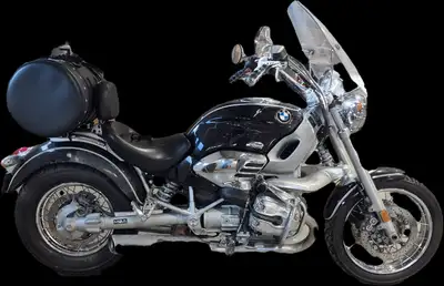 Looking for a legendary cruiser that turns heads and rides like a dream? This 1998 BMW R1200C in sle...