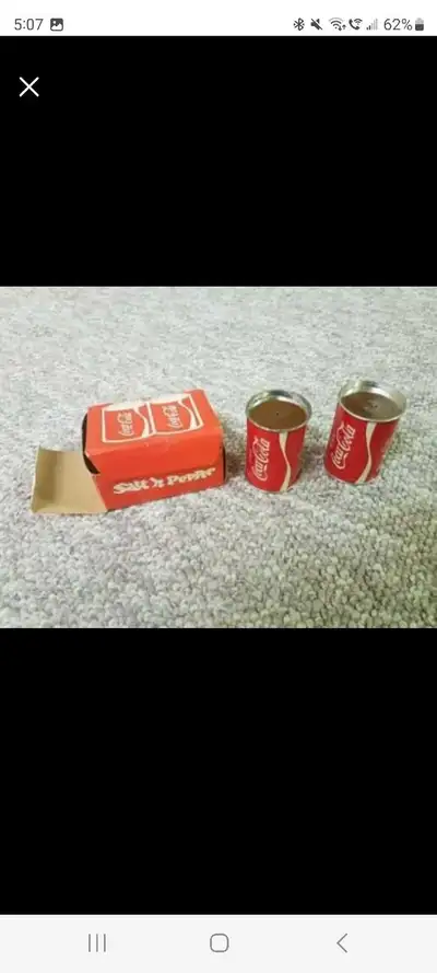 A set of Coca Cola Salt and Pepper shaker