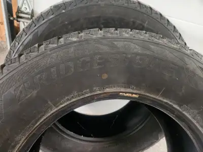 Good used set of Bridgestone Blizzak tires over 60% tread left, dont have jeep any more to go back o...