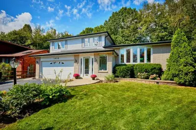 Welcome to this charming detached five level split bungalow tucked away on a peaceful, private court...