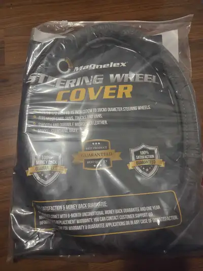 This is a brand new Magnalex Steering Wheel Cover, designed to fit steering wheels from 14 1/2 inch...