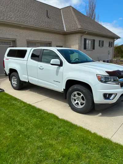 4 cylinder , 2.5 L , 4x4 , trailer package , fog lamps , power driver seat , power windows , A/C , c...