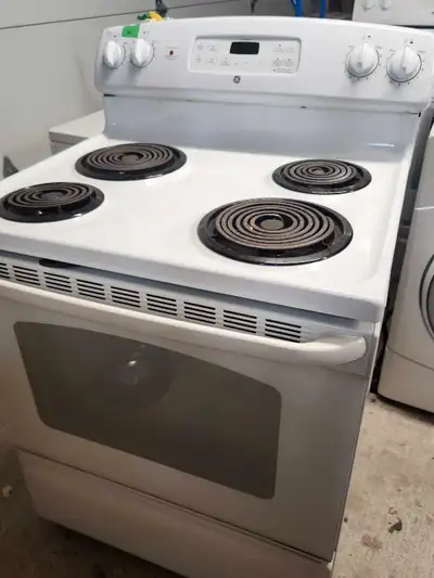 GE White coil top self cleaning electric stove for sale 200.00. It may need a little cleaning inside...