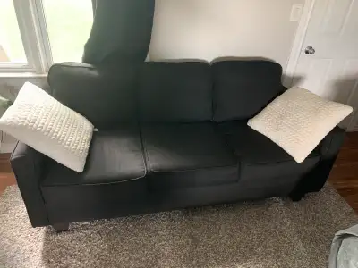 Fabric couch, comfortable and warm Bottom set of cushions are removable 30”H x 33”L x 76”W In good c...