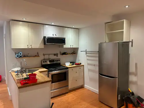 Cozy 3rd floor loft bedroom with second floor live in space apartment in a century home with a balco...