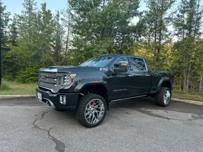 Feast your eyes on this magnificent 2020 GMC Sierra Denali HD, a beast of a truck as the 4 inch lift...