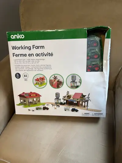 Farm set with tractors and animals and buildings. Brand new in box. Smoke and pet free home. Located...