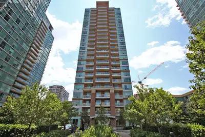 This 2-bedroom, 2-bathroom bright corner unit features two private balconies - one off the living ar...