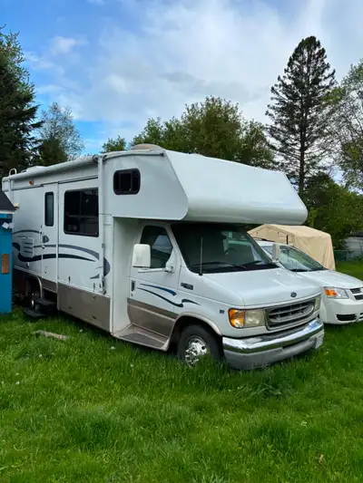 1999 Ford Georgie Boy RV with 95000kms or 59000 miles .Ford V10 Triton Engine gas engine. Bunk over...