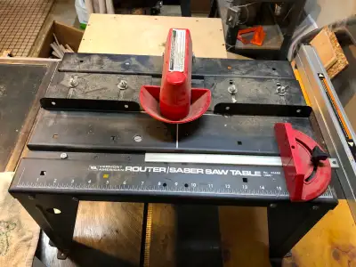 Router/Sabre saw table.  All metal with safety guard, View more