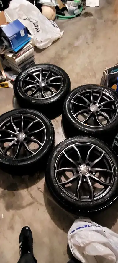 Selling for a friend. Came of a subaru. 4 rims 3 good tires and one tire is no good. Rims overall ar...