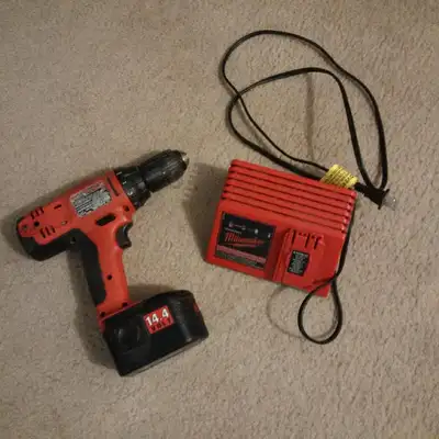 Milwaukee 14.4 drill, battery, battery charger for sale, View more