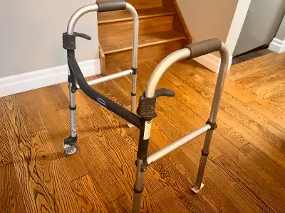 This is an Invacare walker, designed to be foldable and adjustable, supporting up to 300 lbs, and it...